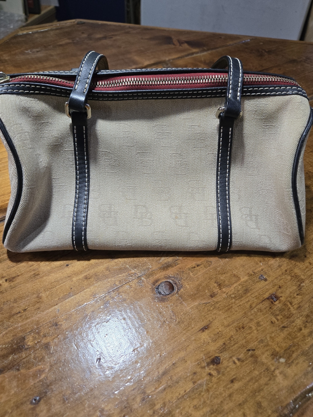 Dooney & Bourke Beige Canvas Shoulder Bag with Black Trim and Red Zipper